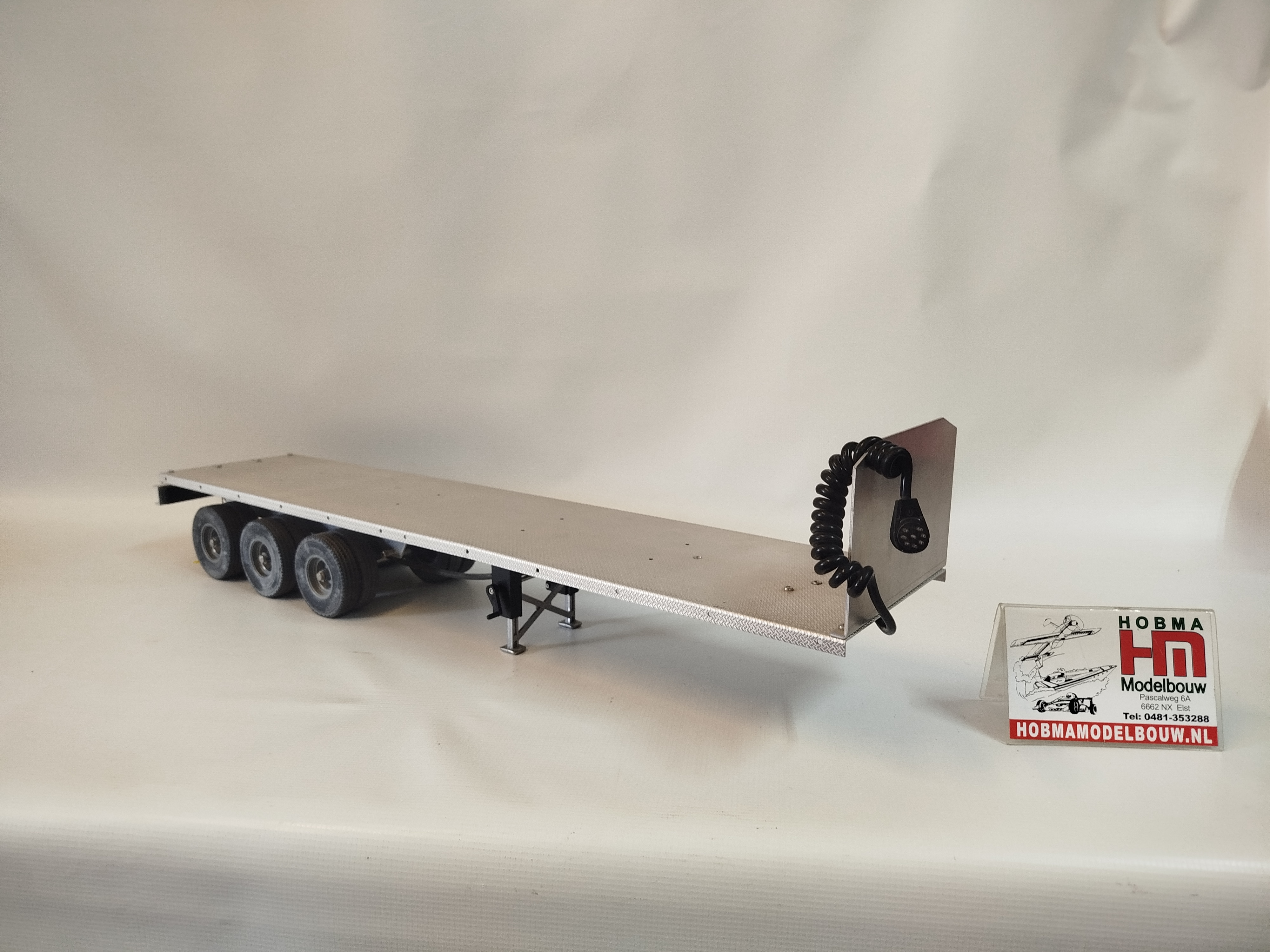 Tweedehands Wedico flatbed oplegger met 8 polige verlichting
